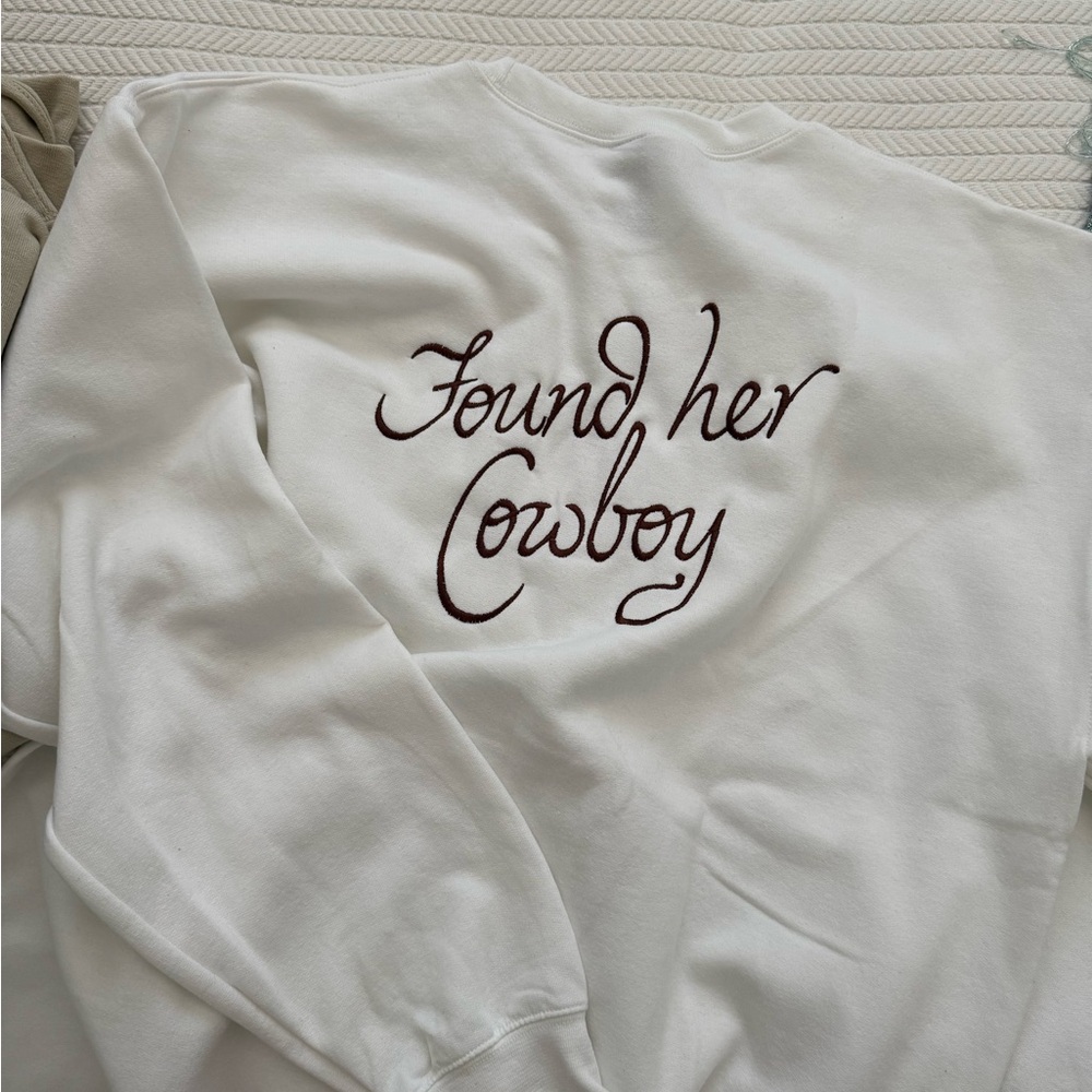 White Sweatshirt with 'Found her Cowboy' Text